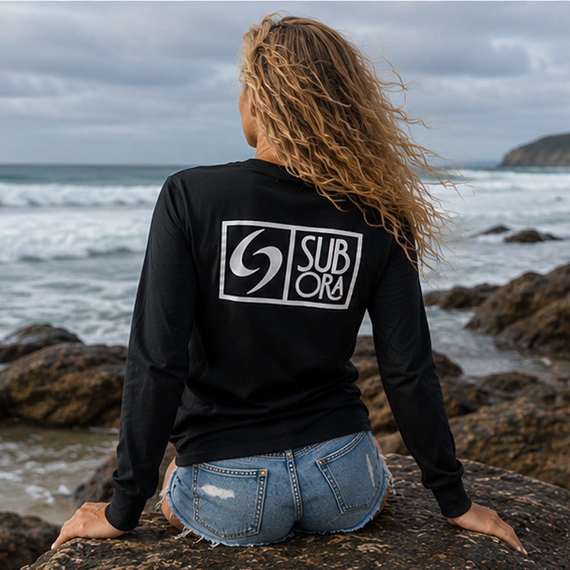 subora, subora surf, Subora Surf Co,  living in the moment, shiggles, surf, surfing, beach, swimwear, summer, tshirt, Subora  Ombak logo Tee black, Ombak, womens surf tshirt, womens surf tee australia, womens beach tshirt,
womens coastal tshirt, womens black surf tee, australian surfwear womens tshirt, womens oversized surf tshirt, womens casual beach tee, womens lifestyle surf tshirt, womens graphic surf tee, long sleeve tshirt, long sleeve tshirt 