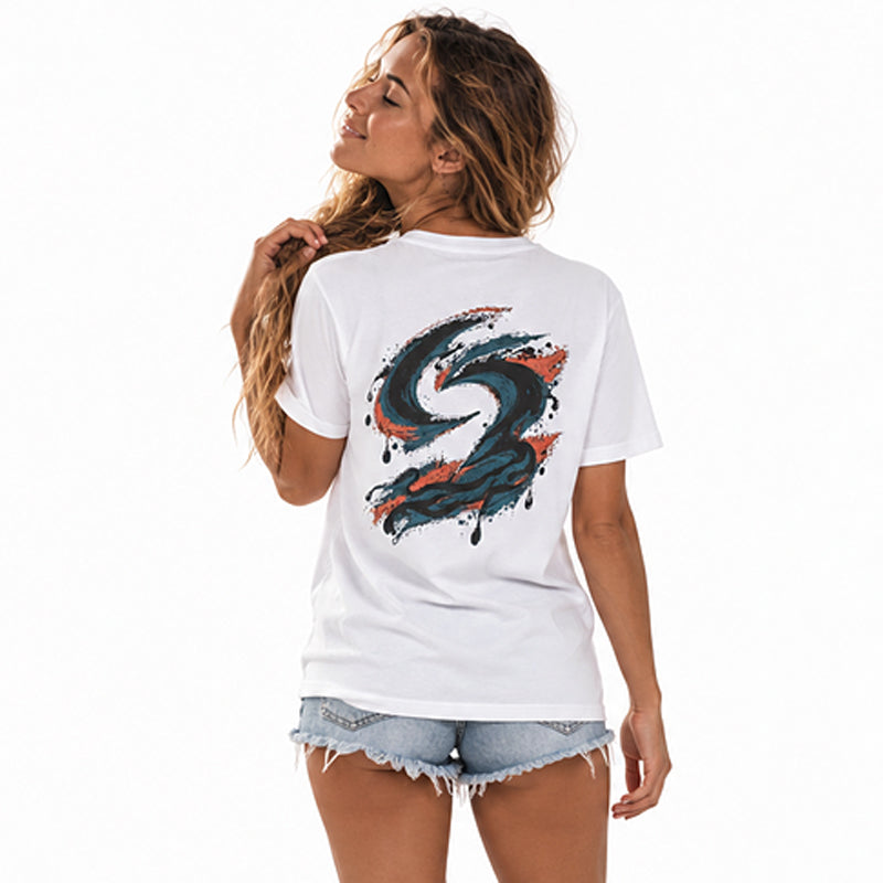 Back view of the Subora Wax Tee in White on a female model, showing the full-colour dripping wax Subora S back print in navy, blue and coral