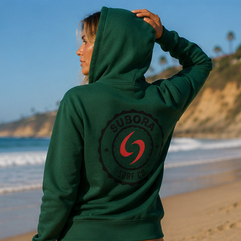 Subora, subora surf, Subora Surf Co, hoodie, green hoodie, Coasty, Coasty Logo, Coasty Logo Hoodie, Living in the moment, shiggles, surf, surfing, surf wear, beach, summer, womens green surf hoodie, green womens hoodie australia, womens coastal hoodie, womens beach hoodie, womens oversized green hoodie, surfwear hoodie womens, australian surf hoodie womens, womens pullover green hoodie, womens casual beach hoodie, womens lifestyle surf hoodie